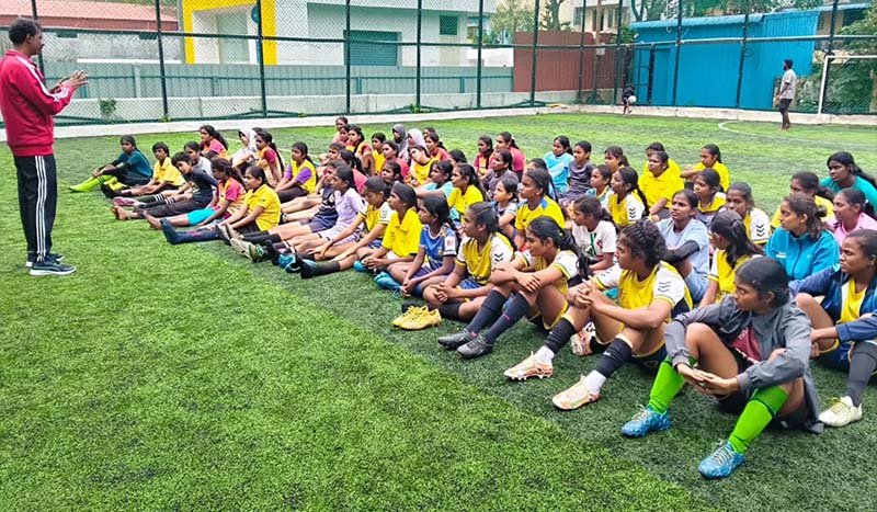 Children and young people taking part in sports together