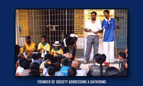 Founder of Society Addressing a Gathering